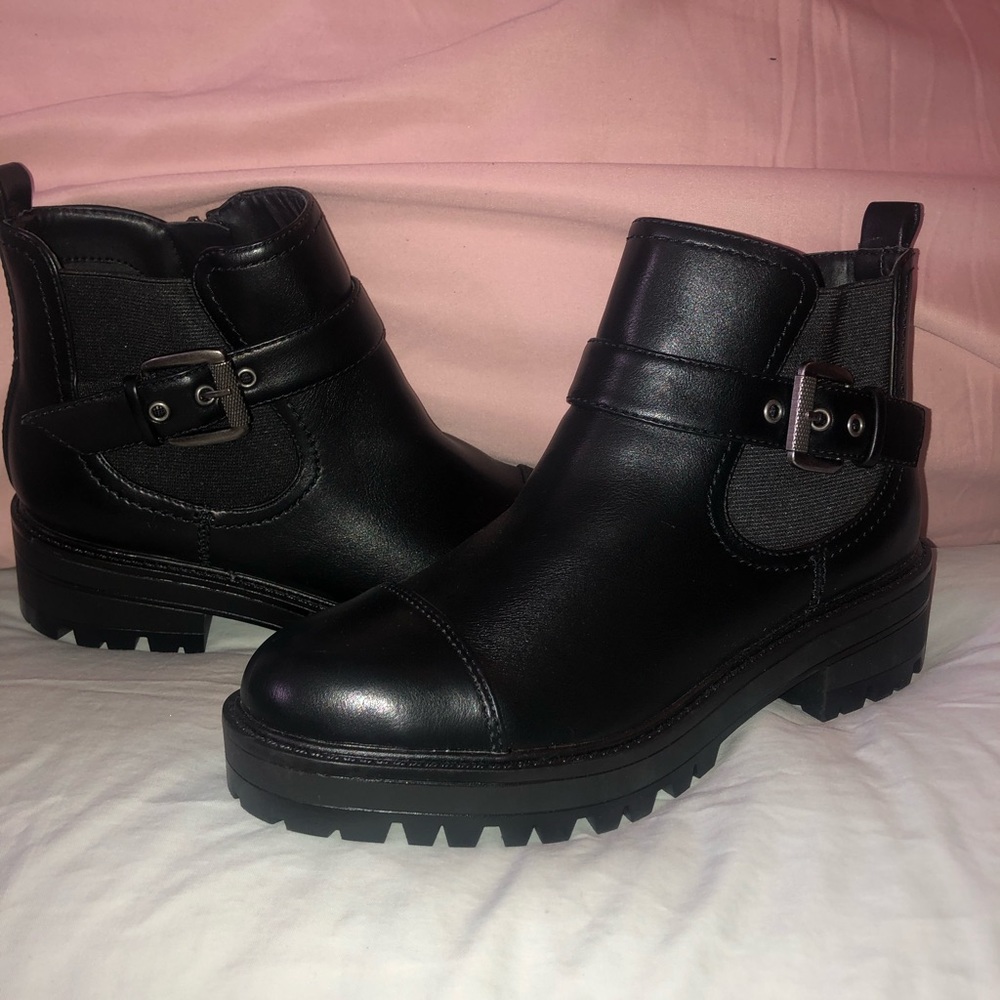 Black booties with silver buckle
